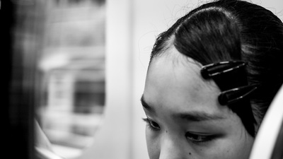 a woman with a hair clip in her hair