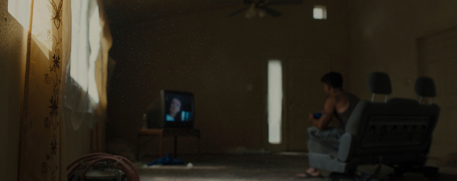 a person sitting in a chair in a room