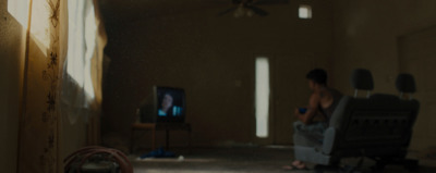 a person sitting in a chair in a room