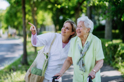 an older woman and a younger woman on bicycles