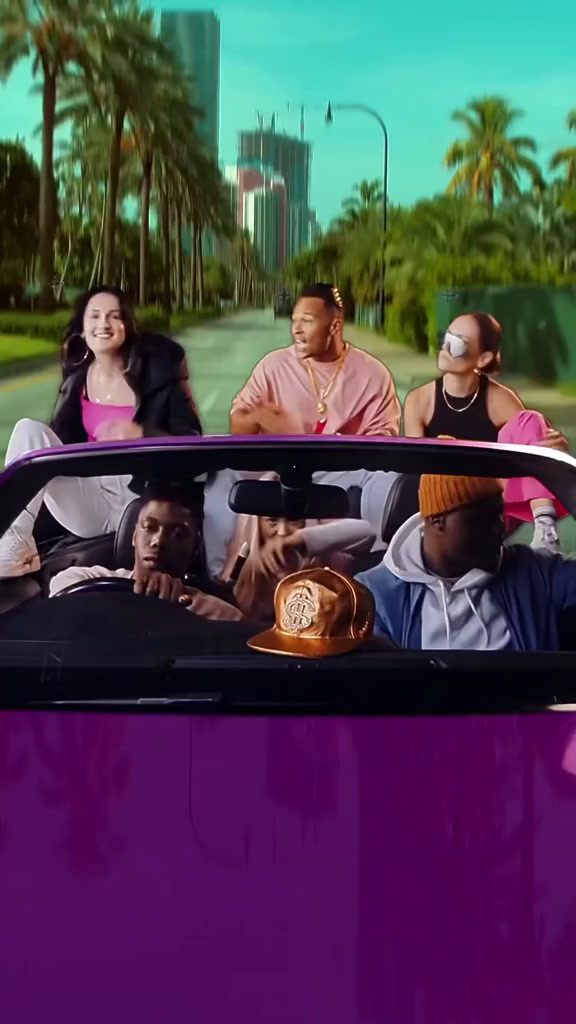 a group of people sitting in the back of a car