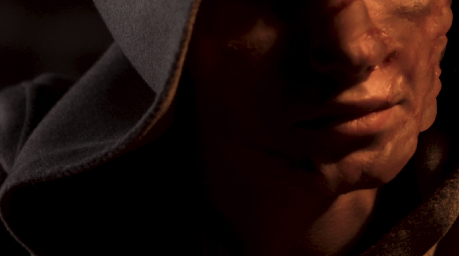 a close up of a person wearing a hoodie