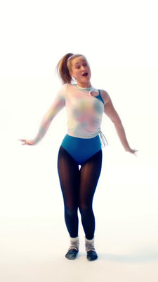 a woman in a blue and white body suit