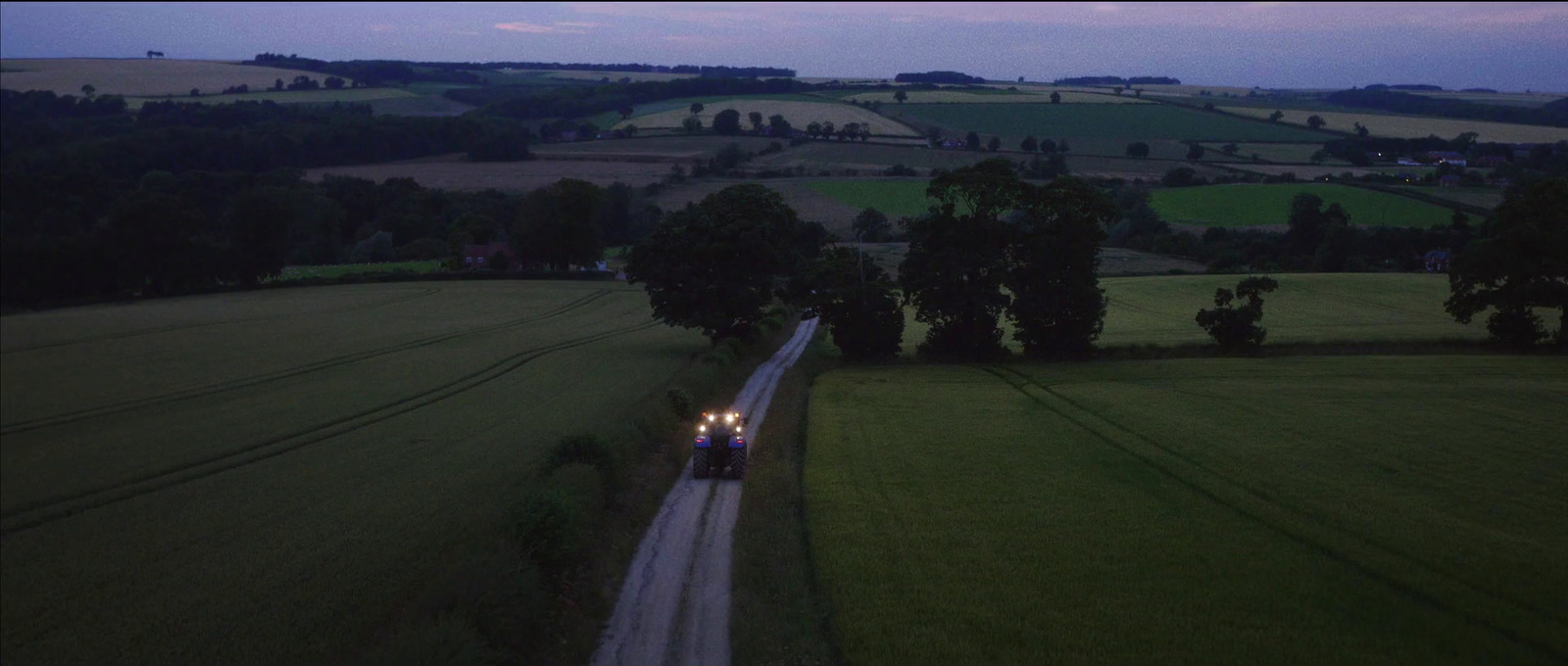 a train traveling through a lush green countryside