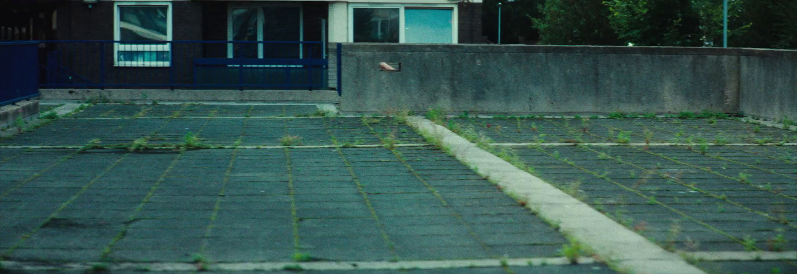 a person riding a skateboard down a street