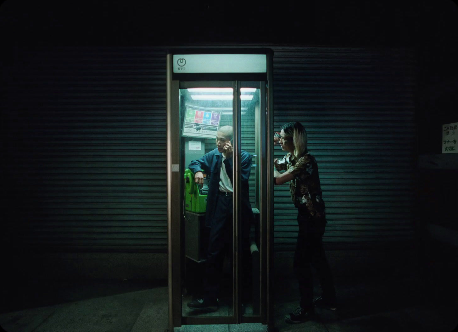 a man and a woman standing in a doorway