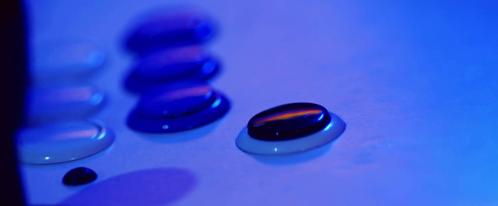 a close up of a cell phone with a blue background