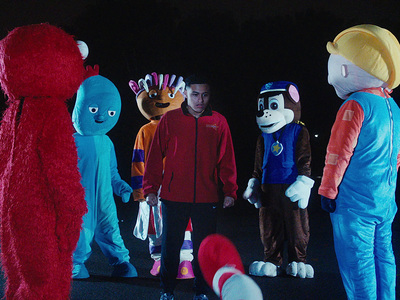 a group of people in costumes standing next to each other