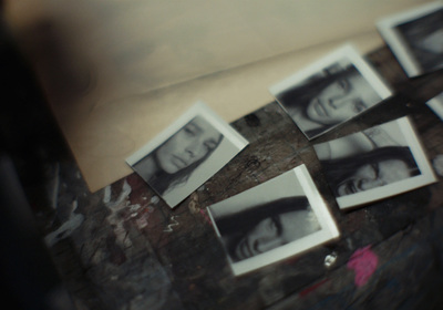 a table topped with pictures of women in black and white