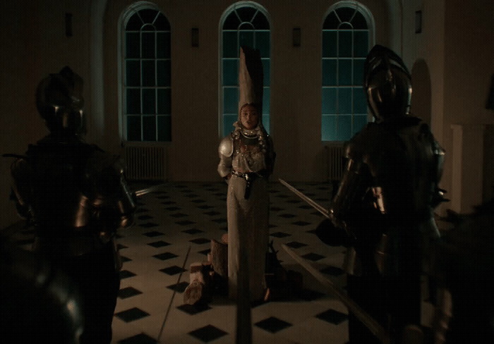 a group of knights standing in a room