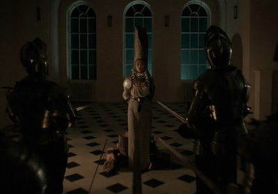 a group of knights standing in a room