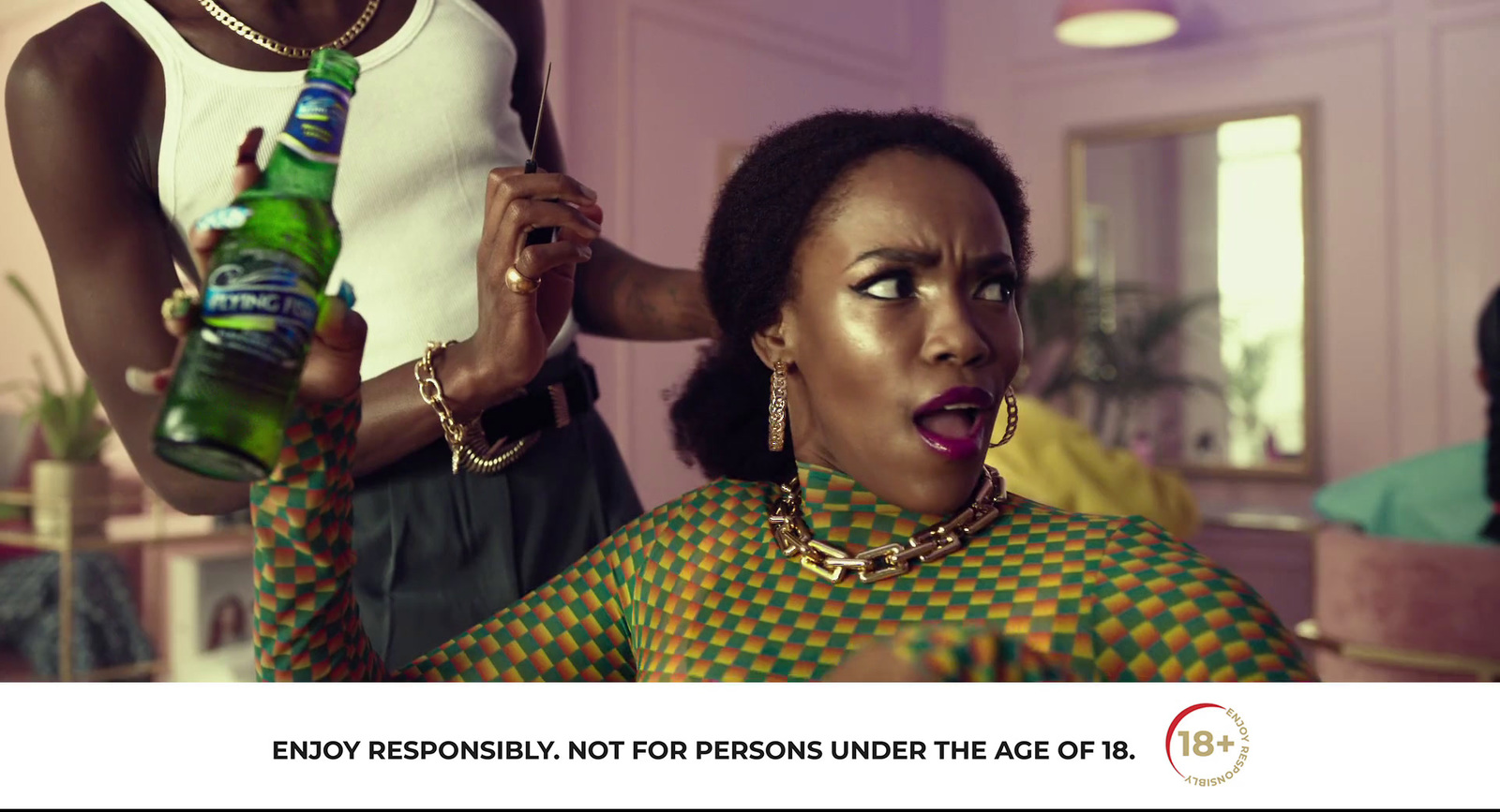 a woman is getting her hair done by another woman