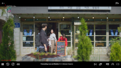 a group of people standing outside of a building