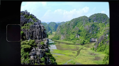 a view of a river and mountains from a window