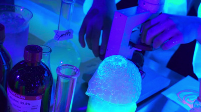 a person is working on a glowing object