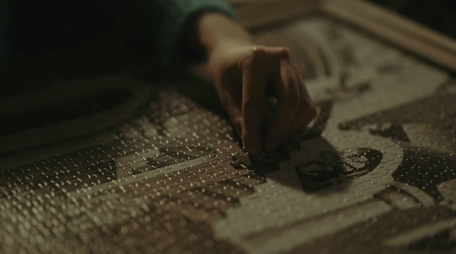 a close up of a person's hand on a piece of paper