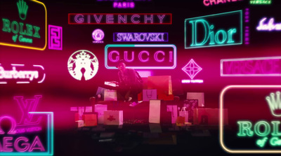 a display of neon signs and symbols in a dark room