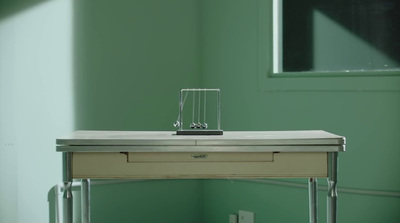 a small table with a drawer on top of it