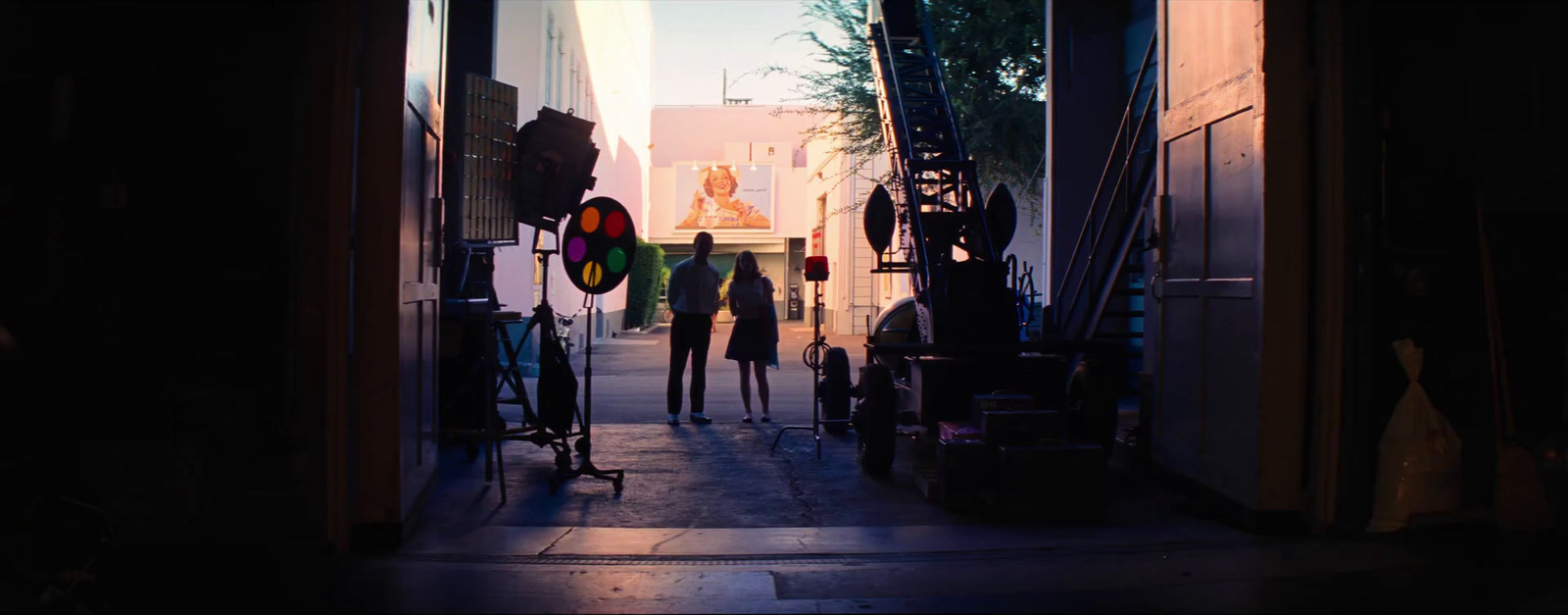 a couple of people that are standing in a doorway