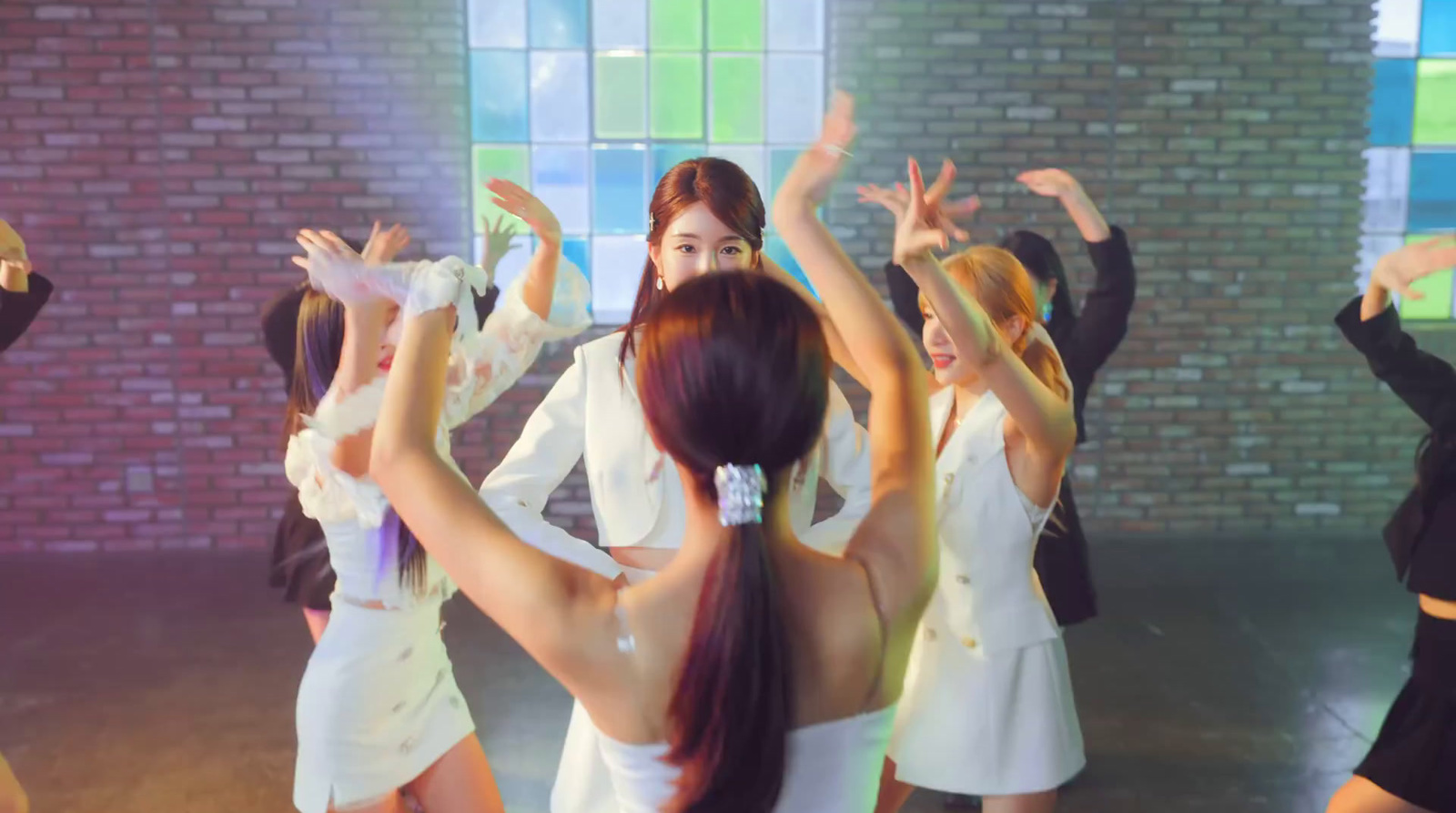 a group of young women dancing in a dance studio