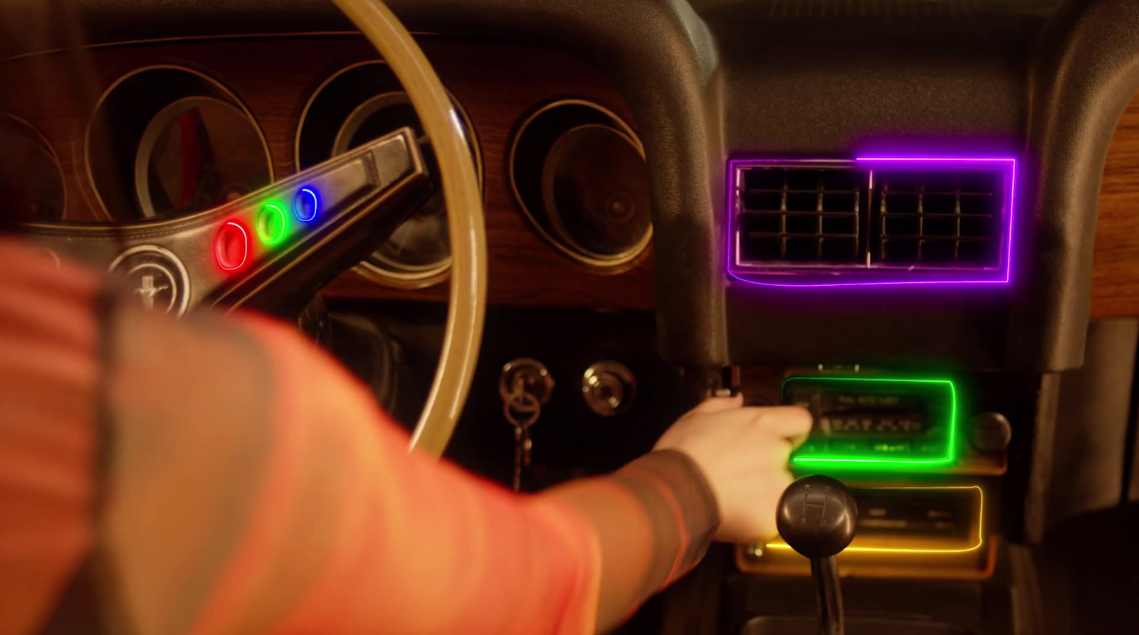 a person driving a car with a steering wheel