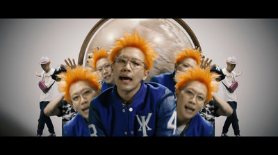 a group of people with orange hair on their heads