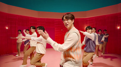 a group of young men dancing in a dance studio