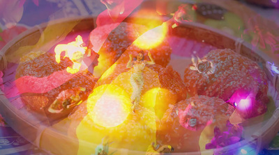 a bowl filled with fruit sitting on top of a table