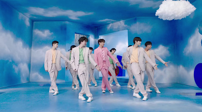 a group of men walking down a runway