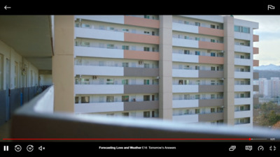 a picture of a building taken from a window