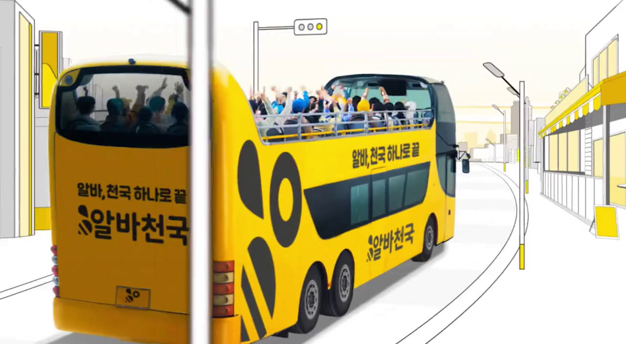 a yellow double decker bus filled with people