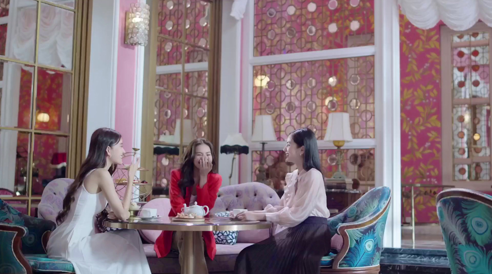 a group of women sitting around a table