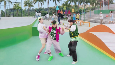 a group of people standing on top of a skate park