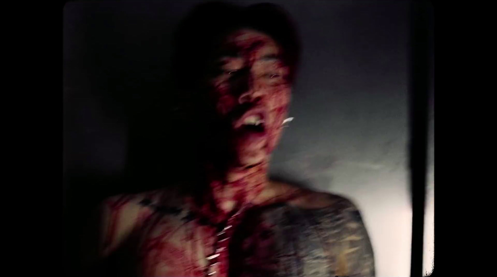 a woman with blood all over her face and neck