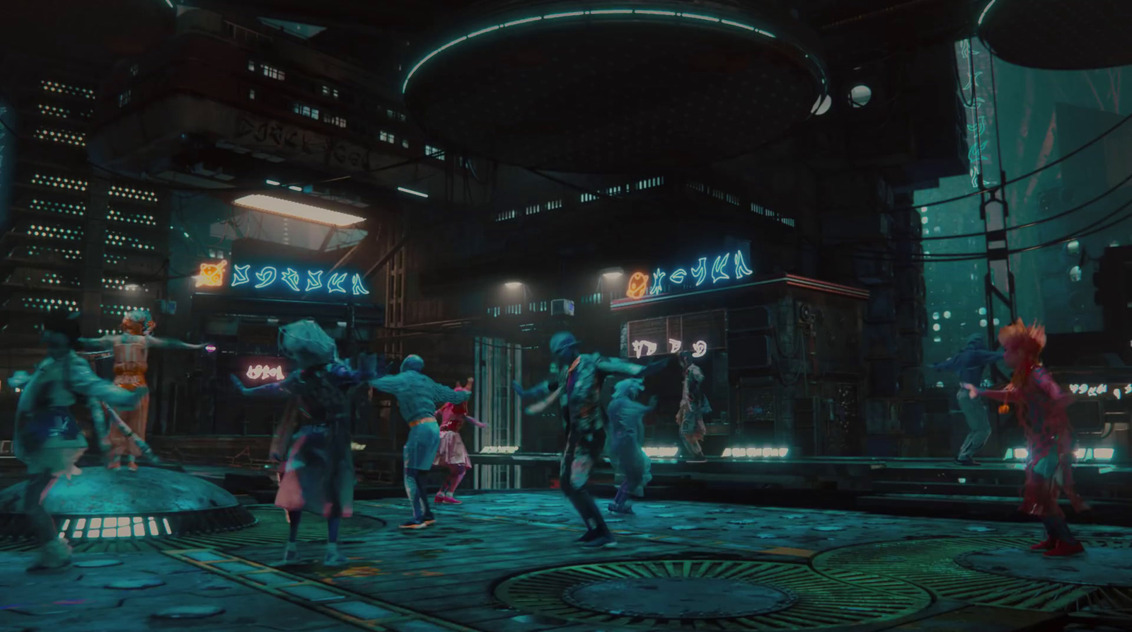 a group of people in a futuristic city at night