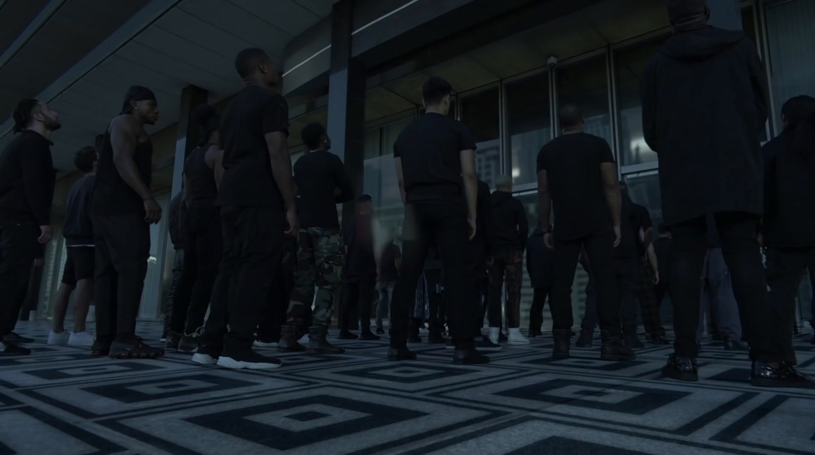 a group of people standing in a room