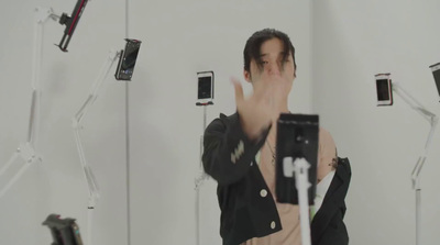 a man taking a picture of himself in a mirror