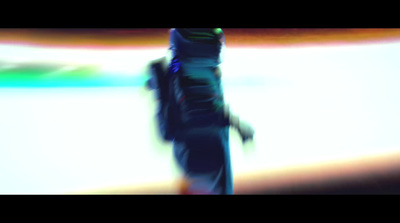 a blurry image of a person on a snowboard