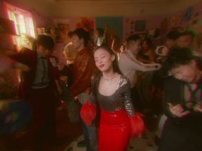 a group of people dancing in a room