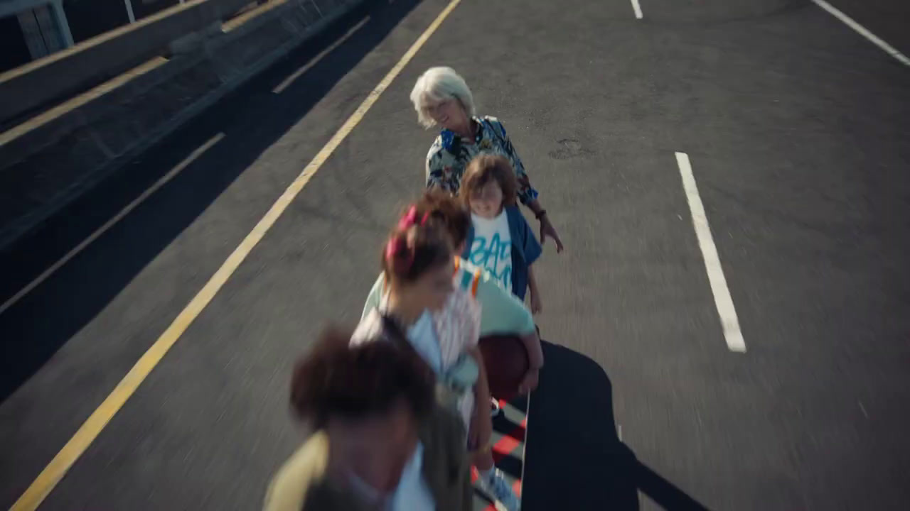 a group of people walking down a street