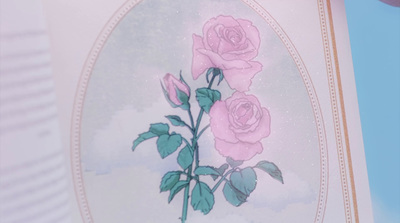 a card with a picture of two pink roses