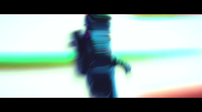 a blurry photo of a person holding a snowboard