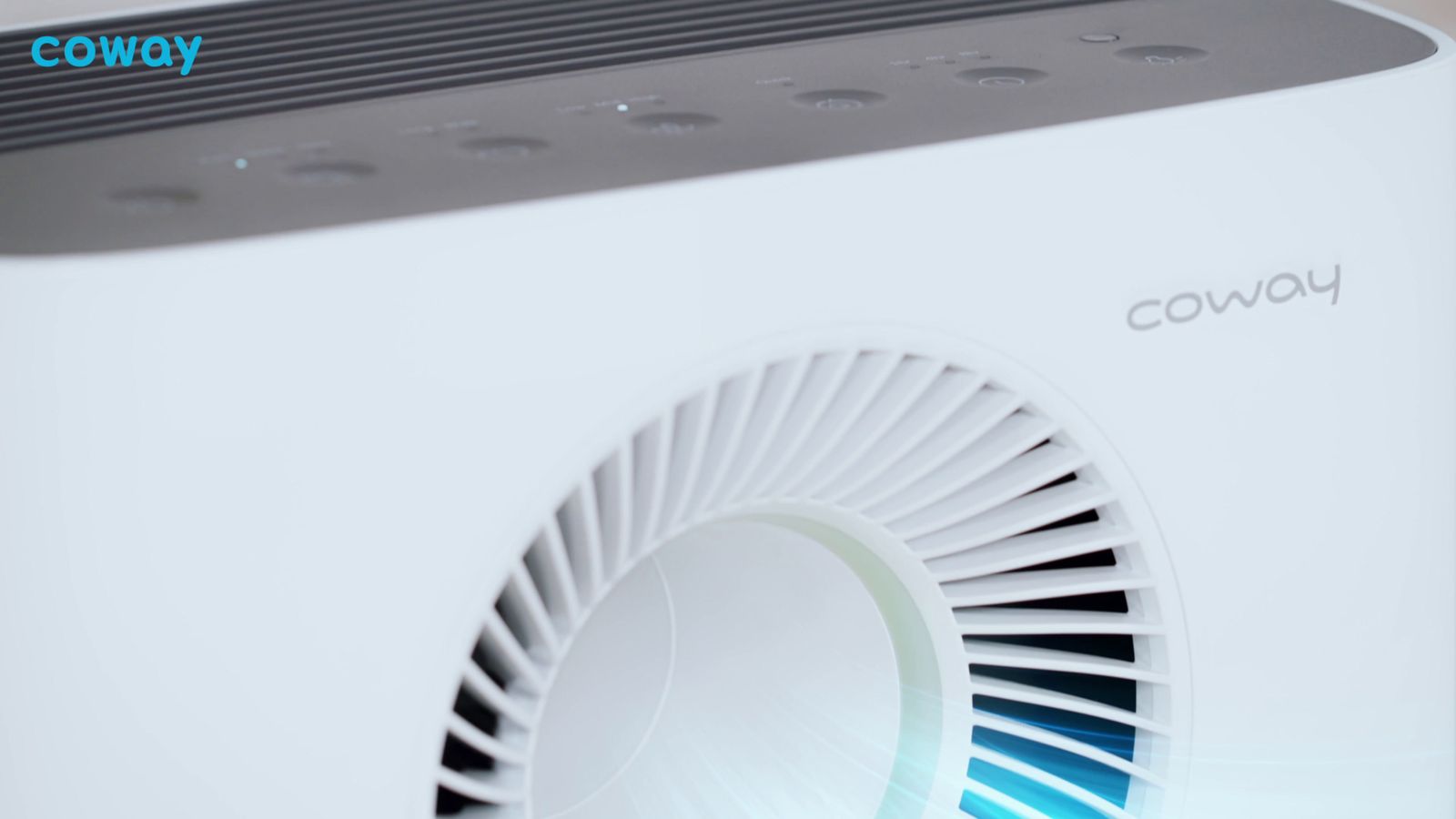 a close up of a white and blue air conditioner