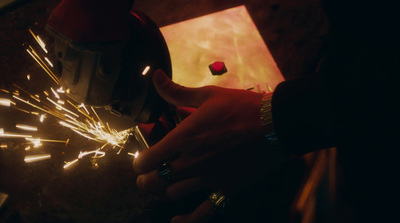 a person holding a sparkler in their hand