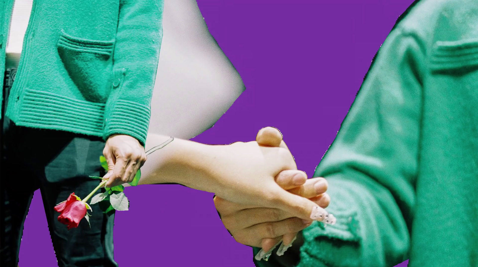 a couple of people holding hands over a purple background