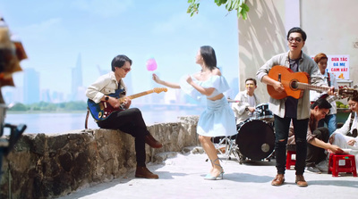 a group of people playing music on the street