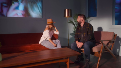 a man and a woman sitting on a couch