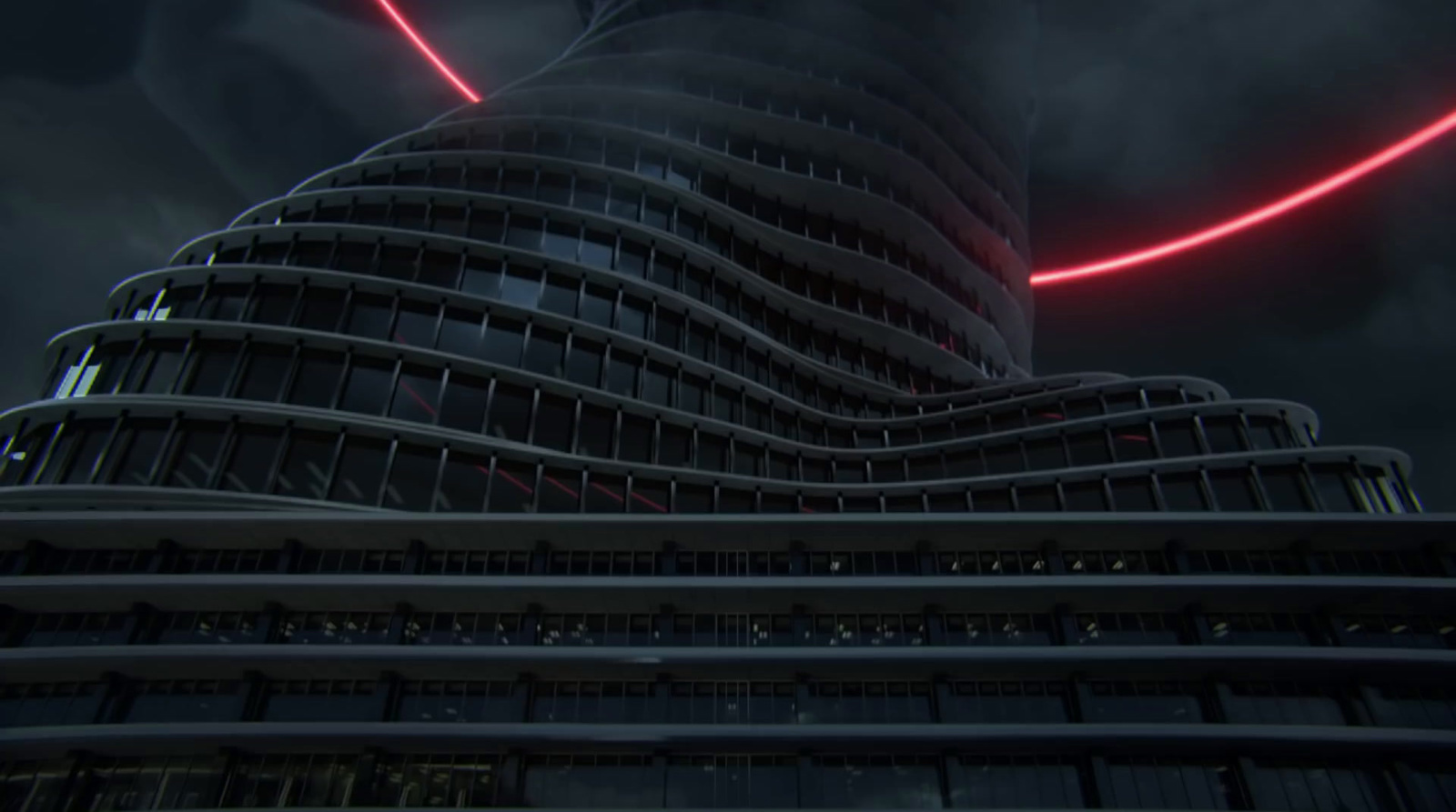 a very tall building with a red light on it's side