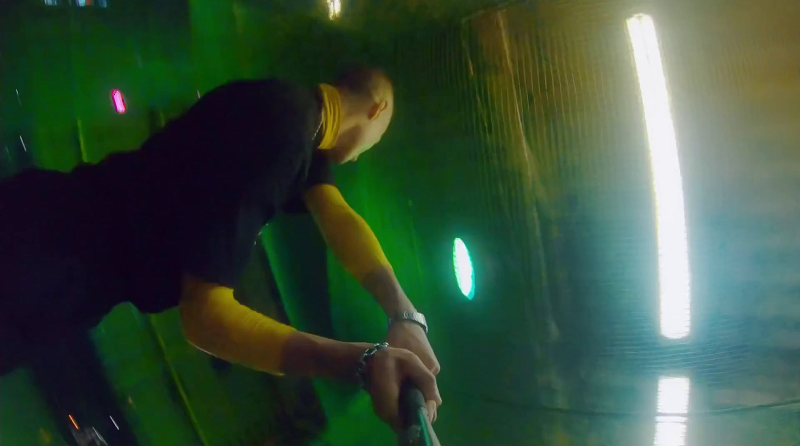 a man holding a tennis racquet on top of a tennis court