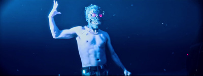 a man with a mask on standing in the water